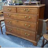 An 18th century cross-banded oak chest of two short over three long drawers with brass swan-neck