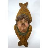 An antique Continental painted lime-wood winged cherub-mask,