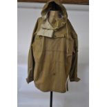An extremely scarce Third Reich pale green Alpine smock, stamped R & A Becker,