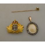 An unmarked gilt metal brooch as a Naval Officer's Queen's Crown cap badge,