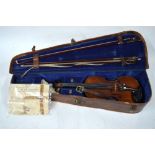 A German violin with 32 cm two-piece back, Stradivarius label within,