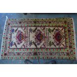 An old Belouch rug,