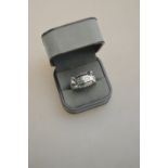A continental style five row channel set diamond ring,