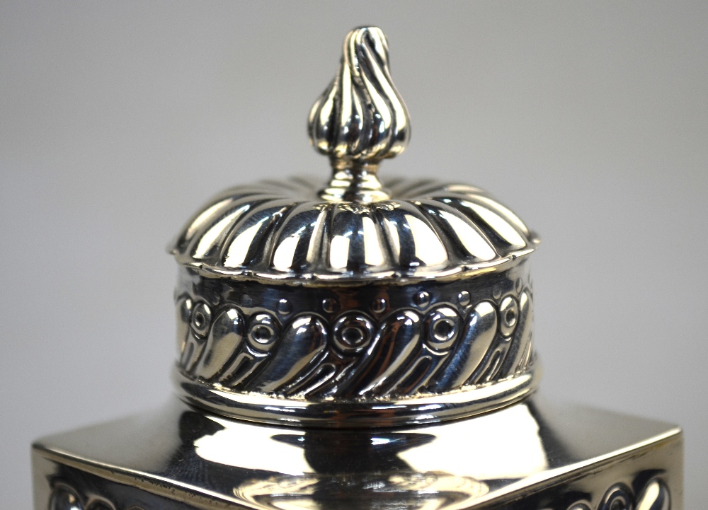 A Victorian embossed silver tea caddy of square form with domed cover, William Comyns & Sons, - Image 2 of 6