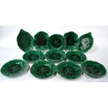 A set of nine Victorian Minton green majolica leaf plates, 22.5 cm diam.