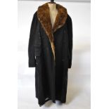 A vintage Army & Navy full length navy blue wool motoring overcoat with musquash and shearling lamb