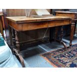 A mid 19th century rosewood library table,