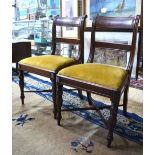 A set of four 19th century mahogany moulded bar back dining side chairs with slip seats,