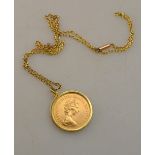 A 1979 gold sovereign in 9ct mount on yellow metal chain, approx 11.