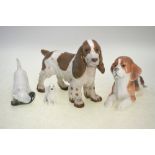 Three Royal Copenhagen dogs - Beagle Lying, no 565; Terrier with slipper,