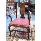 A harlequin set of ten George II-style mahogany dining chairs with vase form splats over slip seats