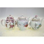 Three English teapots in imitation of the Chinese famille rose,