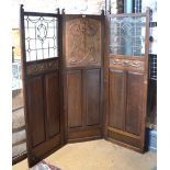 An Arts & Crafts oak three panelled folding screen,