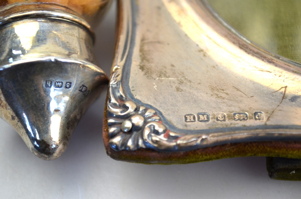 A pair of Edwardian loaded silver specimen vases of tapering form, embossed with irises, - Image 3 of 5
