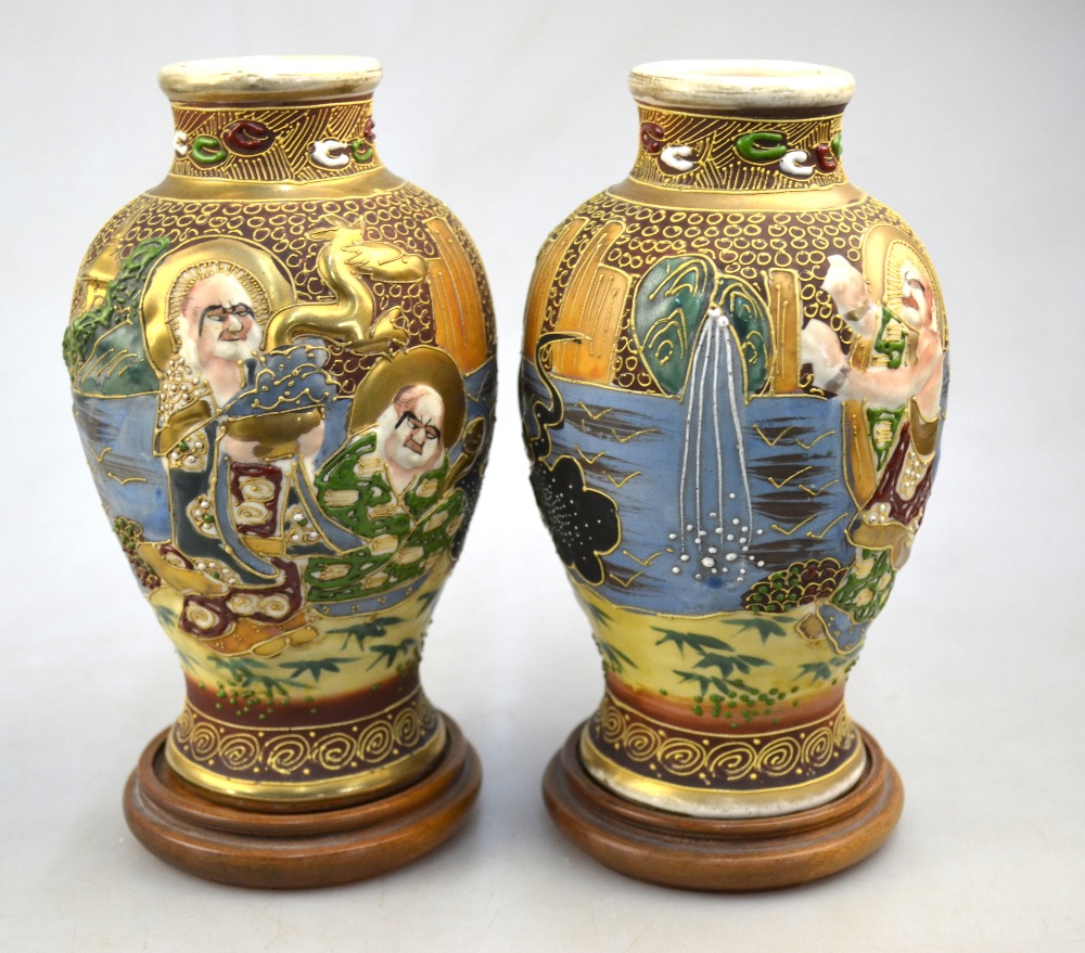 A pair of Satsuma-style vases; each one decorated with Rakan in high relief; - Image 3 of 5