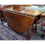 A 17th/18th century single action oak gateleg dining table,