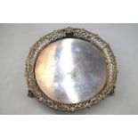 An early George III silver visiting card salver with original pierced and applied rim and pierced