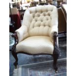 A Victorian dark walnut framed button backed armchairs,