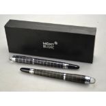 WITHDRAWN Two boxed Mont Blanc 'Starwalker' rollerball pens Condition Report In