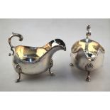 A pair of Old Sheffield Plate pot-bellied sauce-boats with gadrooned rims,