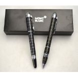 WITHDRAWN A boxed Mont Blanc 'Starwalker' rollerball and ball-point pen-set Condition