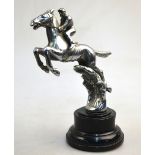 A Desmo Chrome steeplechase horse and jockey car mascot, 14 cm high,