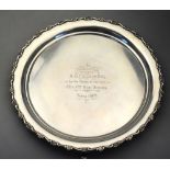 A circular silver letter salver with shell and scroll rim, John Round & Son Ltd.