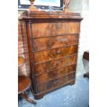 A 19th century Continental flame mahogany semaniere,