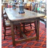 An 18th/19th century French chestnut refectory table,