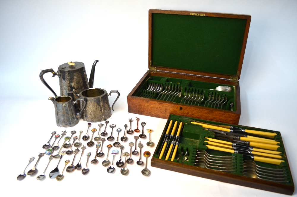 An oak canteen containing a set of OEP flatware,