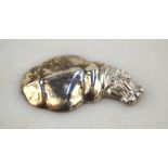 Patrick Mavros: a cast silver small paperweight in the form of a floating Hippopotamus,