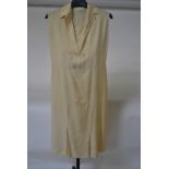 A 1920s cream silk dress,
