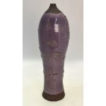 A lavender glazed stoneware baluster vase,