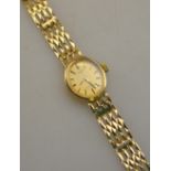 A lady's 9ct gold Rotary wristwatch with quartz movement, on textured gatelink bracelet,