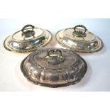 A pair of electroplated oval entree dishes and covers with beaded rims,
