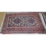 An old Afghan Belouch rug, brown/blue ground, 1.55 x 0.