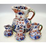 Four Masons Ironstone octagonal Imari decorated jugs, all 19th century, to/w a similar unmarked jug,