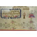 A Victorian needlework cross-stitch sampler, worked with spiritual verse, figures,