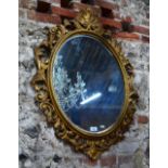 A 19th century carved giltwood framed ov