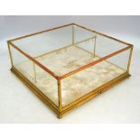 A 19th century gilt gesso table-top vitr