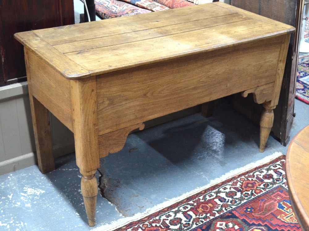 An antique French oak/elm table, the cle