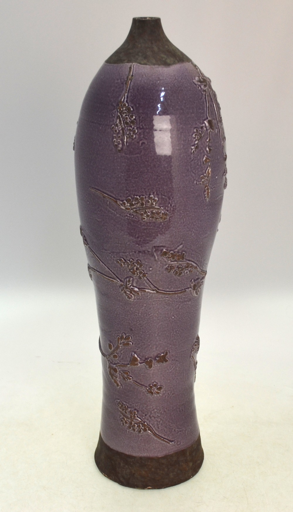 A lavender glazed stoneware baluster vas