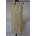 A 1920s cream silk dress, a 1940s green/