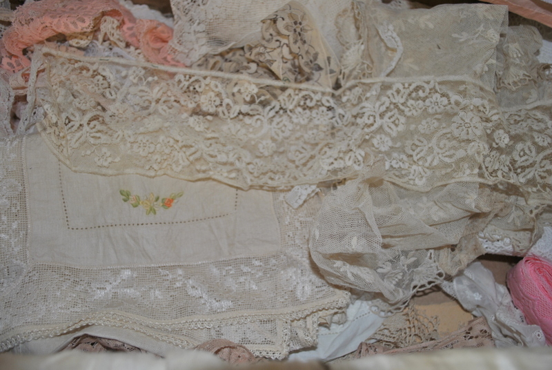 An embroidered cream silk small coverlet