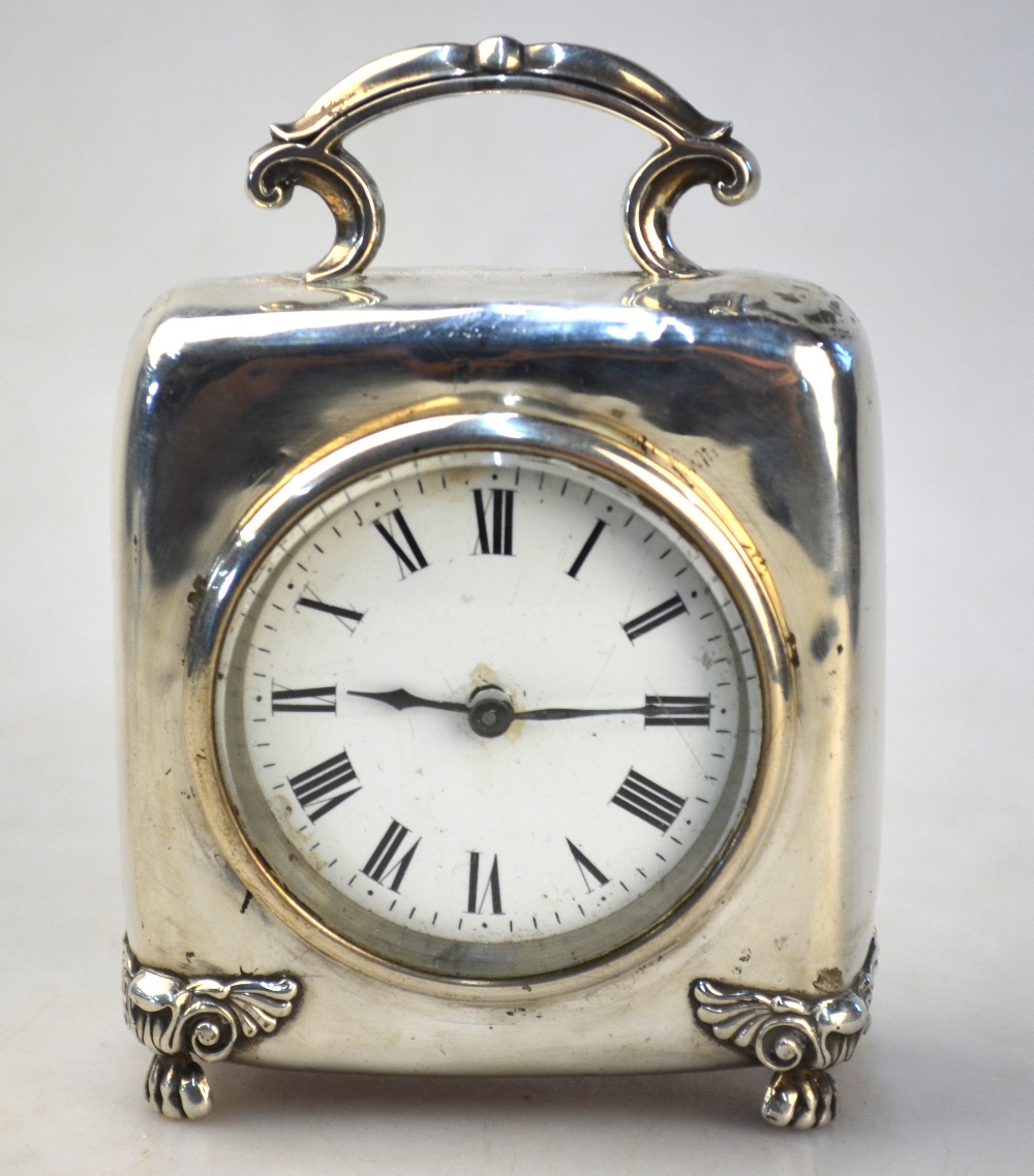 An Edwardian silver-cased boudoir clock