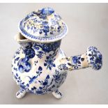 A 18th/19th century continental blue and white tin glaze tripod chocolate pot,