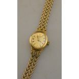 A lady's 9ct gold Rotary wristwatch with quartz movement, on fancy-link bracelet, Birmingham 1982,