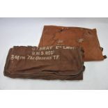 A WW1 period canvas sleeping bag roll with white stencilled inscription 'G T Bray 2nd Lieut RWS