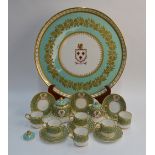 A 19th century Davenport porcelain armorial cabaret set,