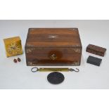 A rosewood work-box with mother of pearl inlay,